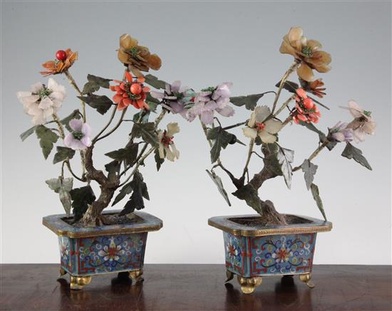 A pair of Chinese hardstone and coral mounted models of trees in cloisonné enamel jardinieres, early 20th century, 30cm, some losses